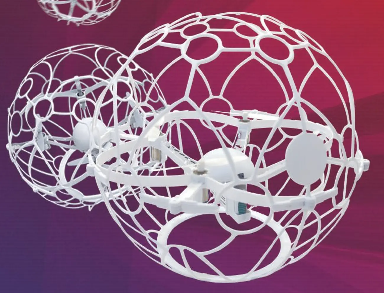Two BALKIN drone soccer balls: white cages with a small drone inside