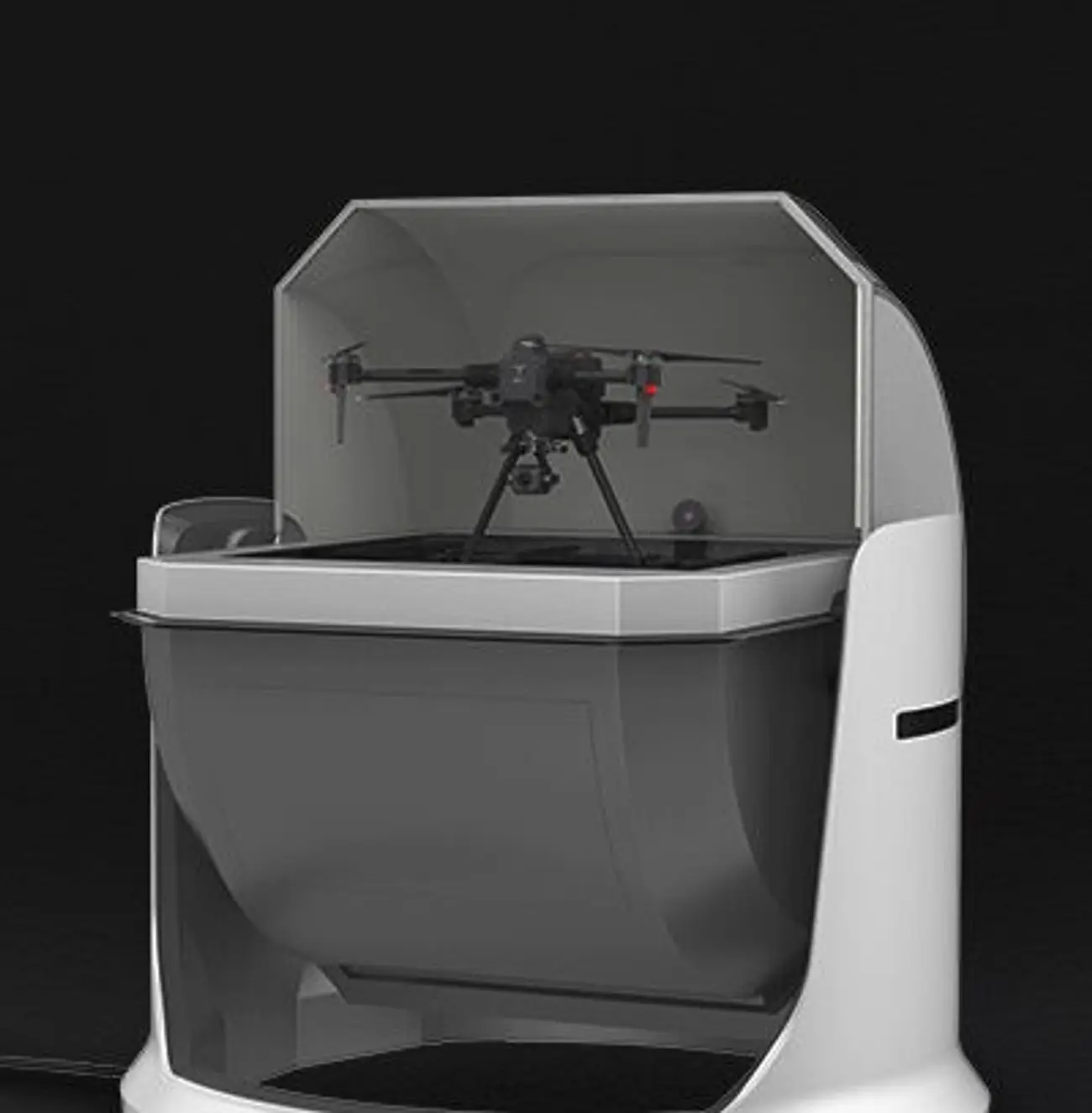 The K01 docking station with its cover open and a drone on the landing pad